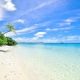 pexels-photo-457882-457882 Stunning beach in Laamu Atoll, Maldives, with turquoise waters and clear skies.